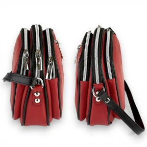 Dwa rzuty boczne czerwonej listonoszki ze skóry naturalnej, pokazujące szerokość komór i mocowanie paska