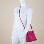 Skórzana torebka listonoszka z długim paskiem przez ramię